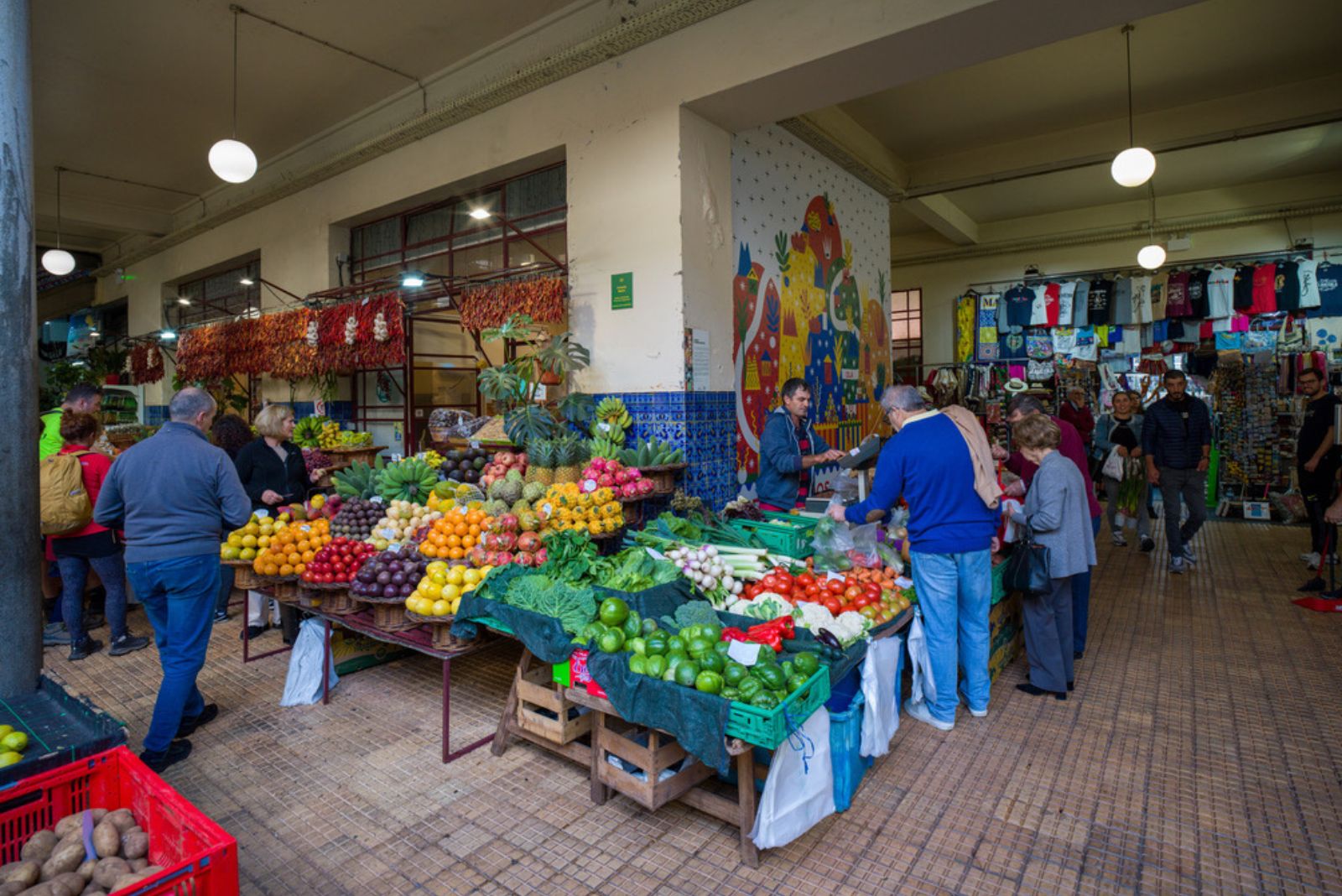 Mercado dos Lavradores Funchal farmers market colorful flowers exotic fruits fresh produce local vendors Madeira Portugal