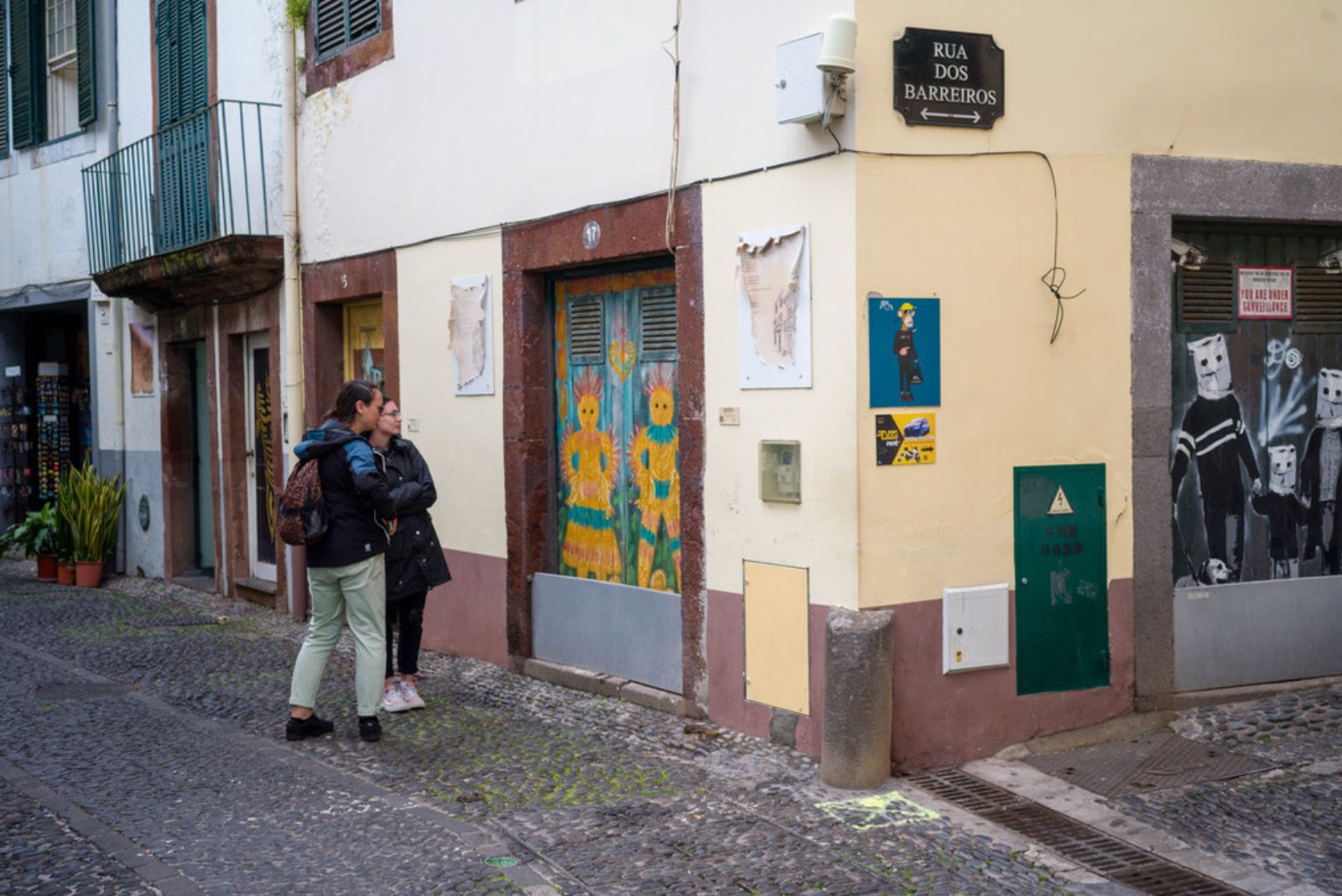 Funchal old town Zona Velha painted doors colorful street art cobblestone streets traditional Portuguese architecture Madeira