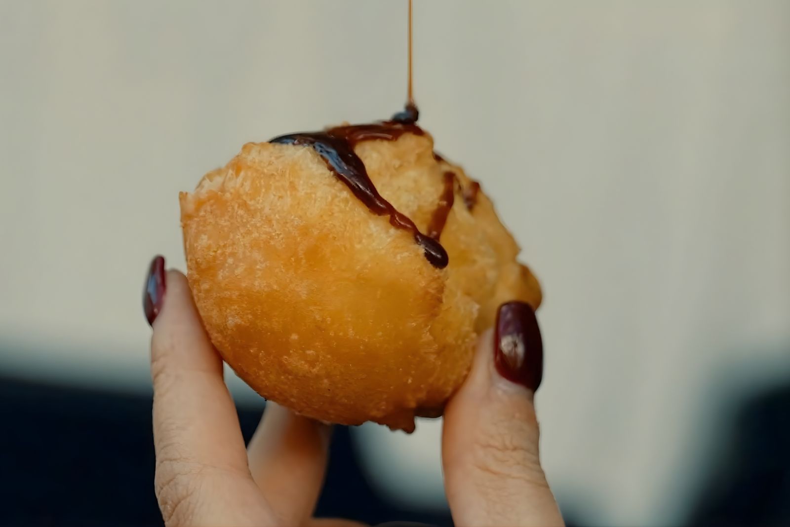 Sonhos Madeira traditional Carnival pastry with sugarcane honey